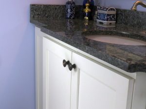 Bathroom cabinet with Apollo Oil Rubbed Brass cabinet knob